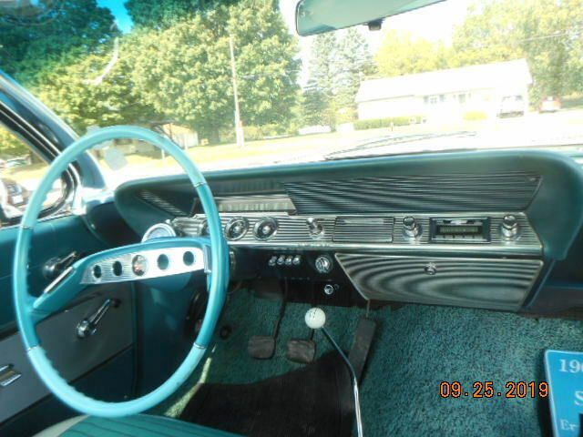1961 White Chevrolet Impala Coupe