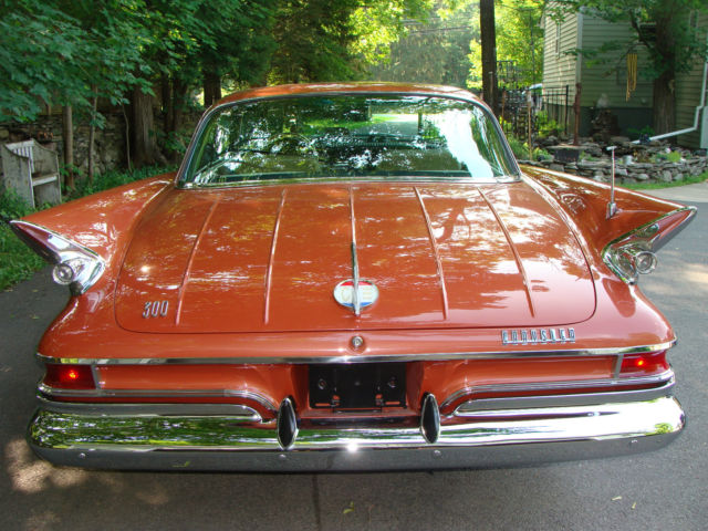1961 cinnamon red Chrysler 300 Series Coupe