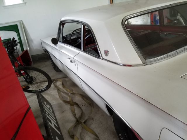 1961 White Oldsmobile Cutlass