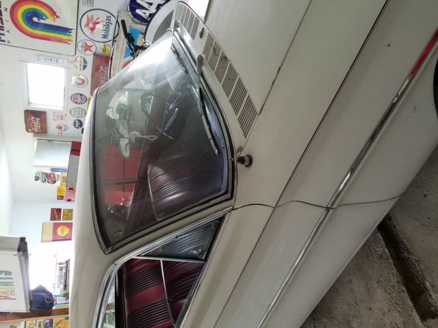 1961 White Oldsmobile Cutlass