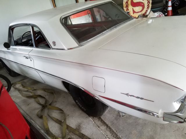 1961 White Oldsmobile Cutlass