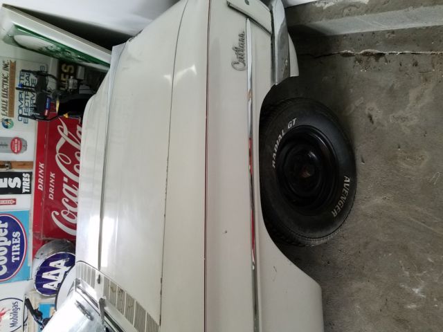 1961 White Oldsmobile Cutlass