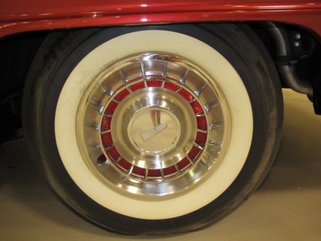 1961 Red Oldsmobile Starfire