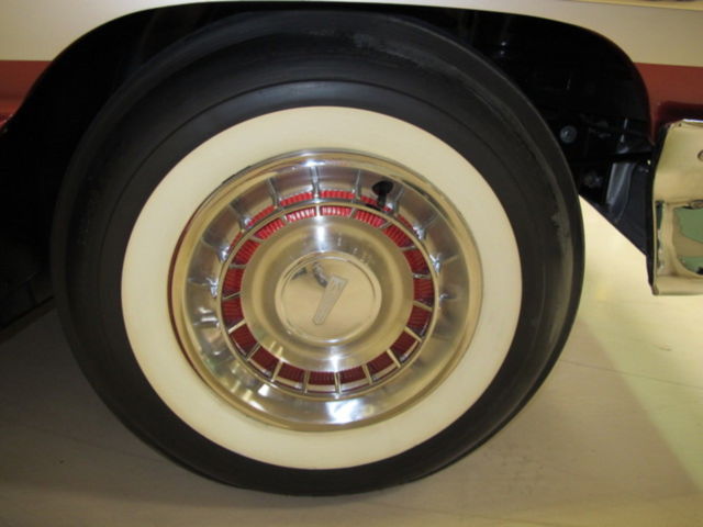 1961 Red Oldsmobile Starfire