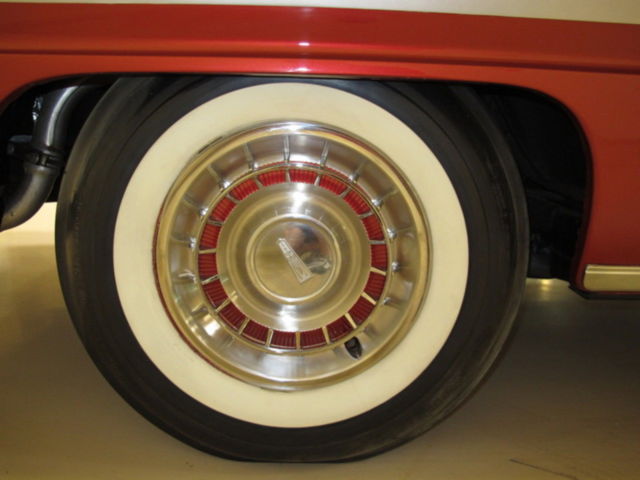 1961 Red Oldsmobile Starfire