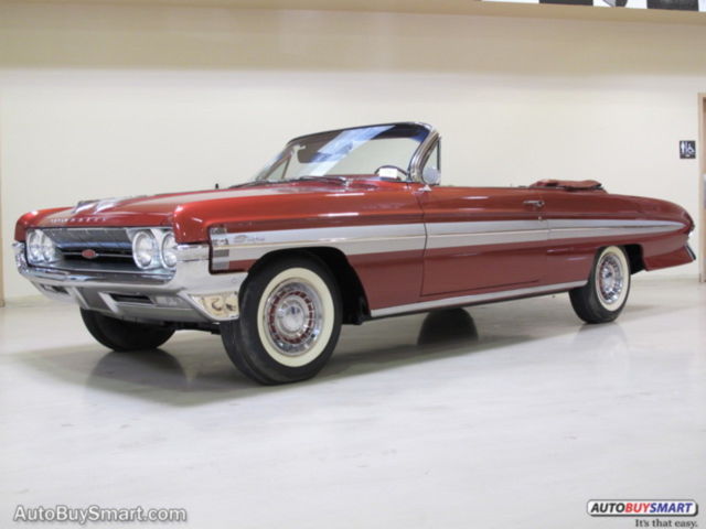 1961 Red Oldsmobile Starfire