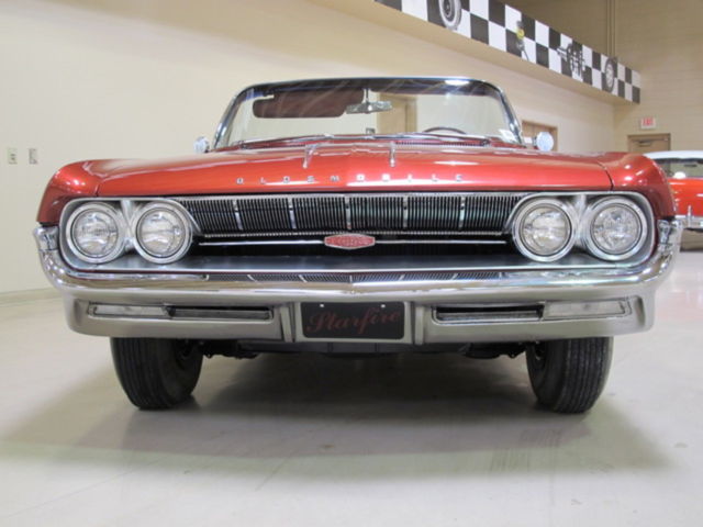 1961 Red Oldsmobile Starfire