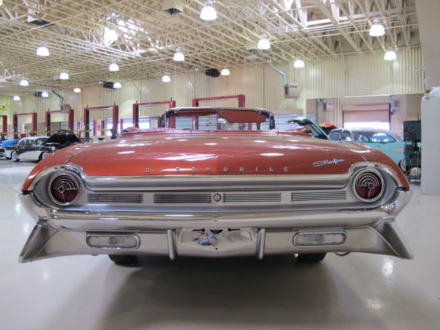 1961 Red Oldsmobile Starfire
