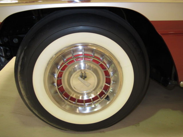 1961 Red Oldsmobile Starfire