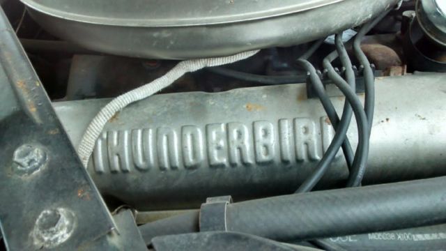 1961 White Ford Thunderbird Convertible