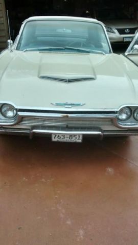 1961 White Ford Thunderbird Convertible