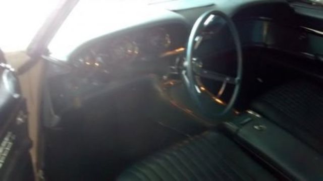 1961 White Ford Thunderbird Convertible