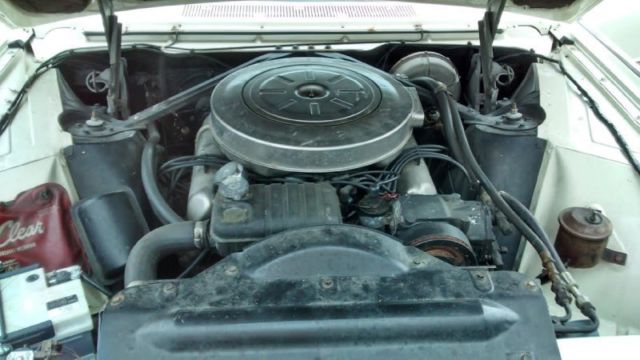 1961 White Ford Thunderbird Convertible