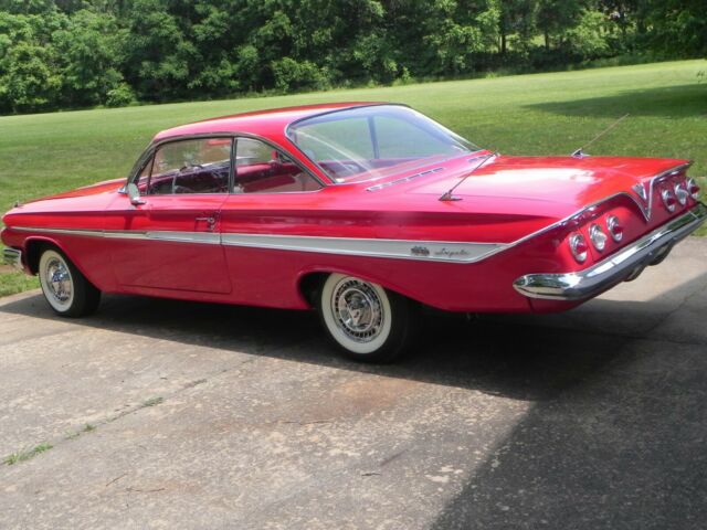 1961 Red Chevrolet Impala Coupe