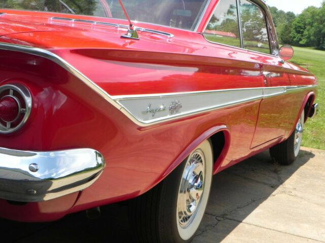 1961 Red Chevrolet Impala Coupe