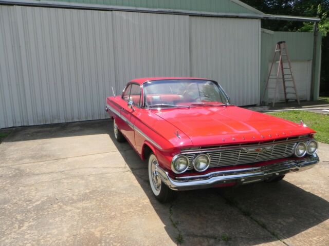 1961 Red Chevrolet Impala Coupe