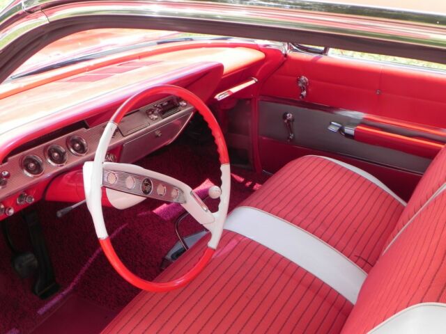 1961 Red Chevrolet Impala Coupe