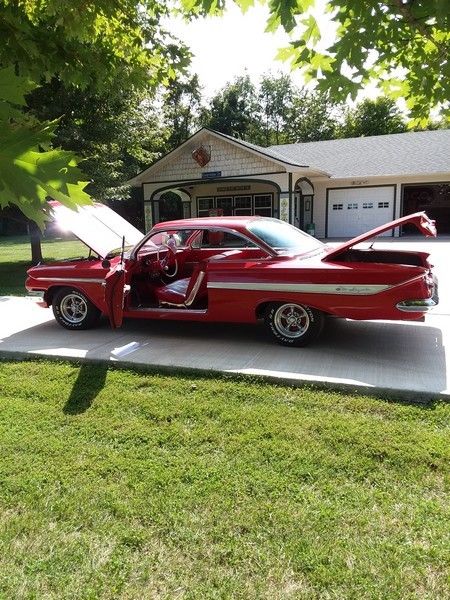 1961 Red Chevrolet Impala Coupe