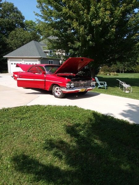 1961 Red Chevrolet Impala Coupe