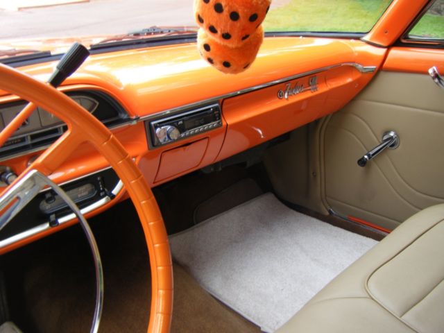 1961 Orange Ford Fairlane Coupe