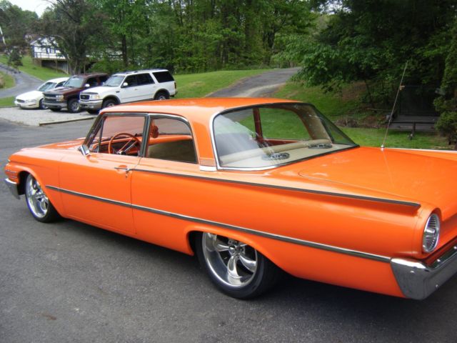 1961 Orange Ford Fairlane Coupe