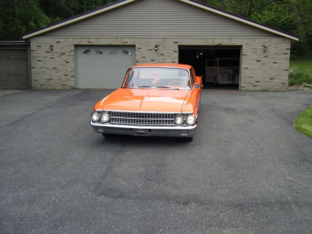 1961 Orange Ford Fairlane Coupe