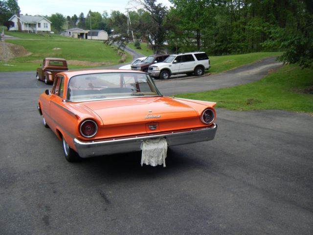 1961 Orange Ford Fairlane Coupe
