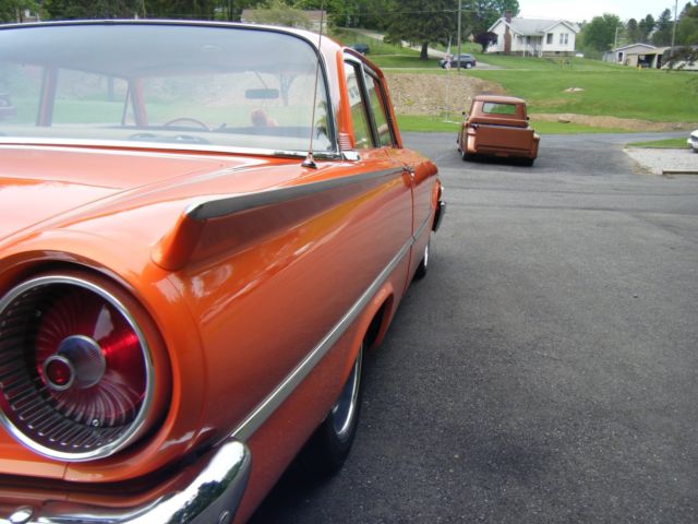 1961 Orange Ford Fairlane Coupe