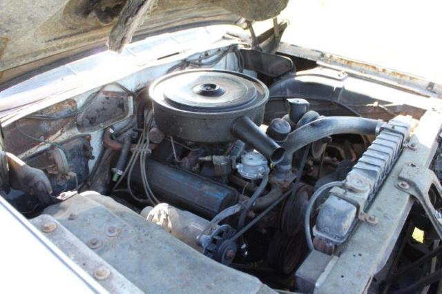 1962 White Cadillac DeVille Coupe