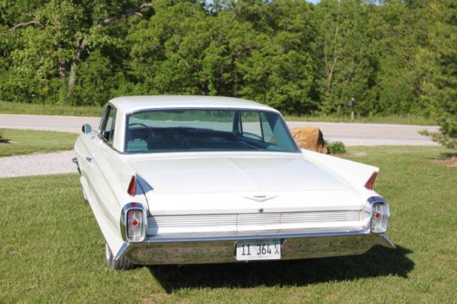 1962 White Cadillac DeVille Coupe