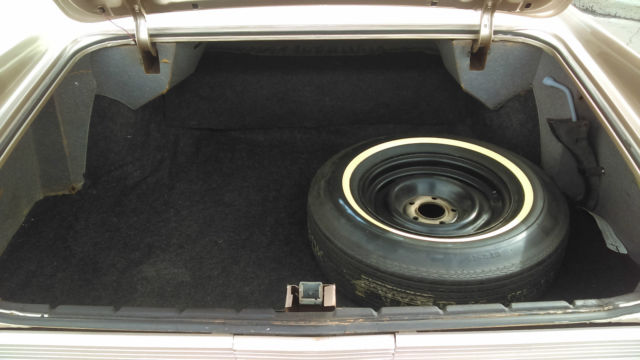 1962 Gold Cadillac DeVille Coupe