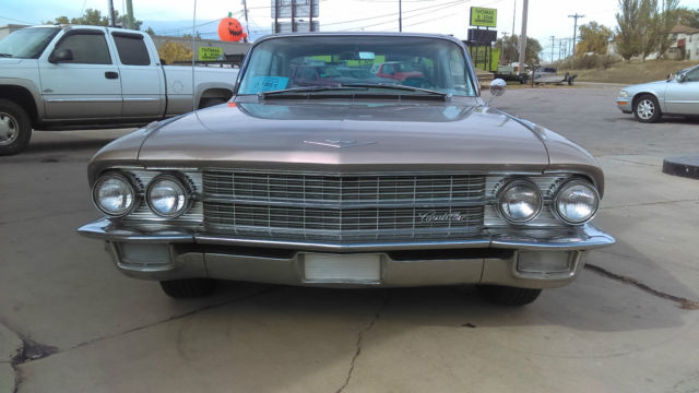 1962 Gold Cadillac DeVille Coupe