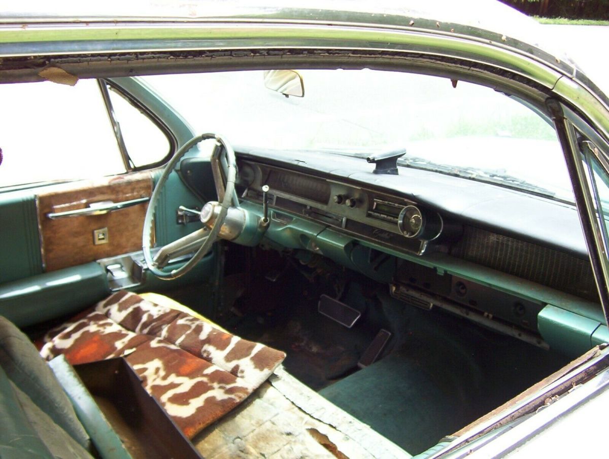 1962 White Cadillac Fleetwood Sedan