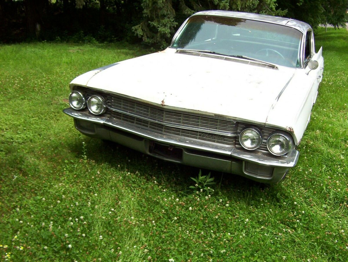 1962 White Cadillac Fleetwood Sedan