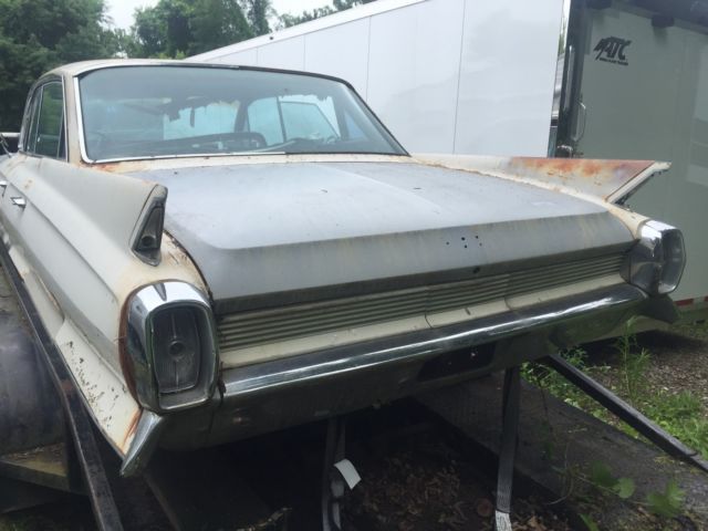 1962 White Cadillac DeVille Sedan