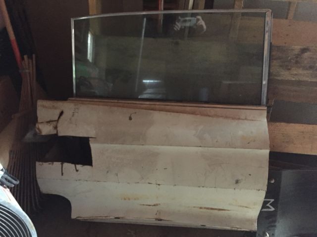 1962 White Cadillac DeVille Sedan