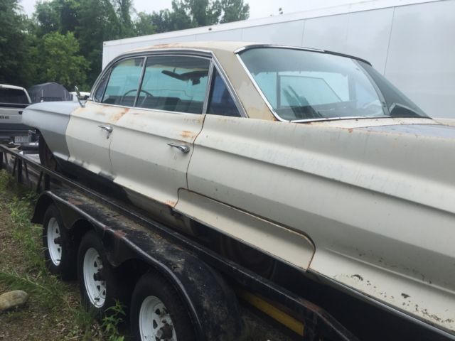 1962 White Cadillac DeVille Sedan