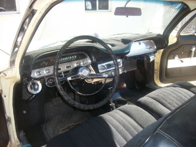 1962 yellow Chevrolet Corvair coupe