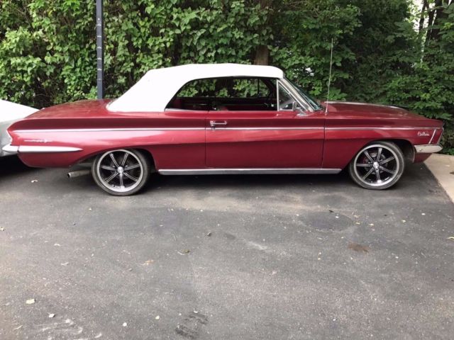 1962 Burgundy Oldsmobile Cutlass Convertible