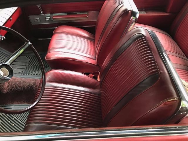 1962 Burgundy Oldsmobile Cutlass Convertible