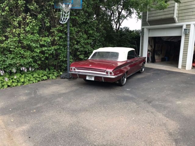 1962 Burgundy Oldsmobile Cutlass Convertible