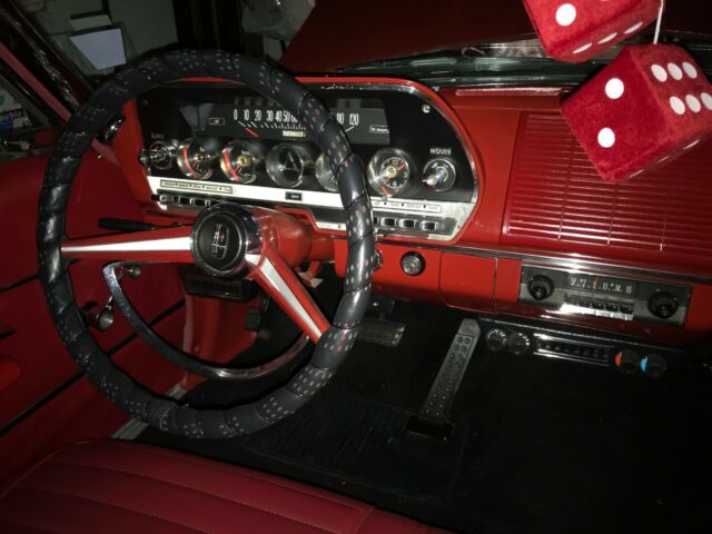 1962 Red with white top Dodge Dart Convertible