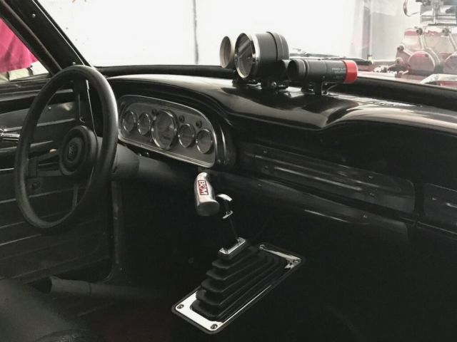 1962 Burgundy Ford Falcon Coupe