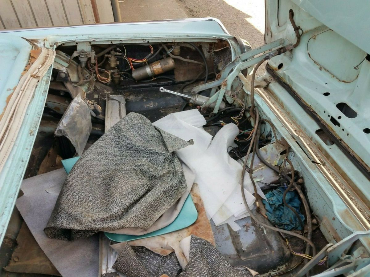 1962 Turquoise Ford Thunderbird Convertible