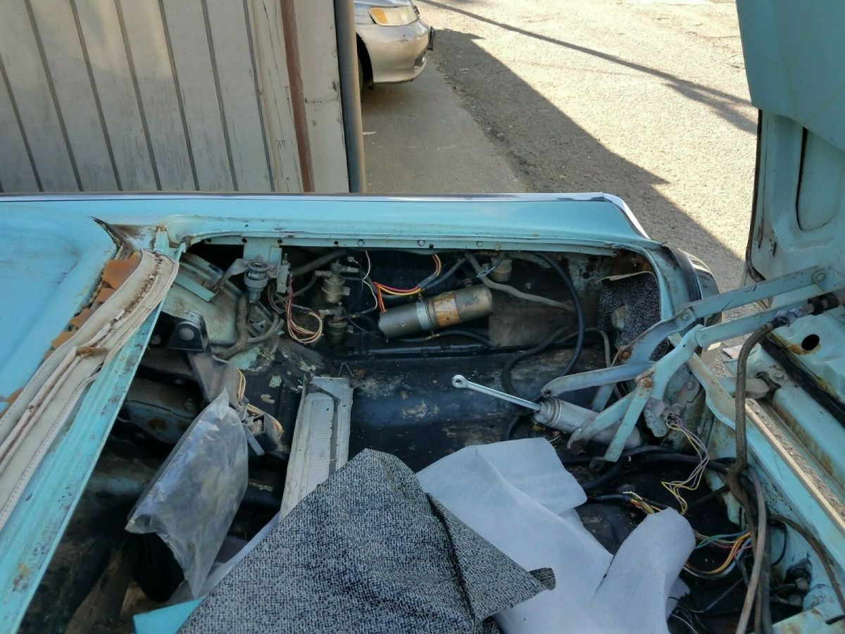 1962 Turquoise Ford Thunderbird Convertible