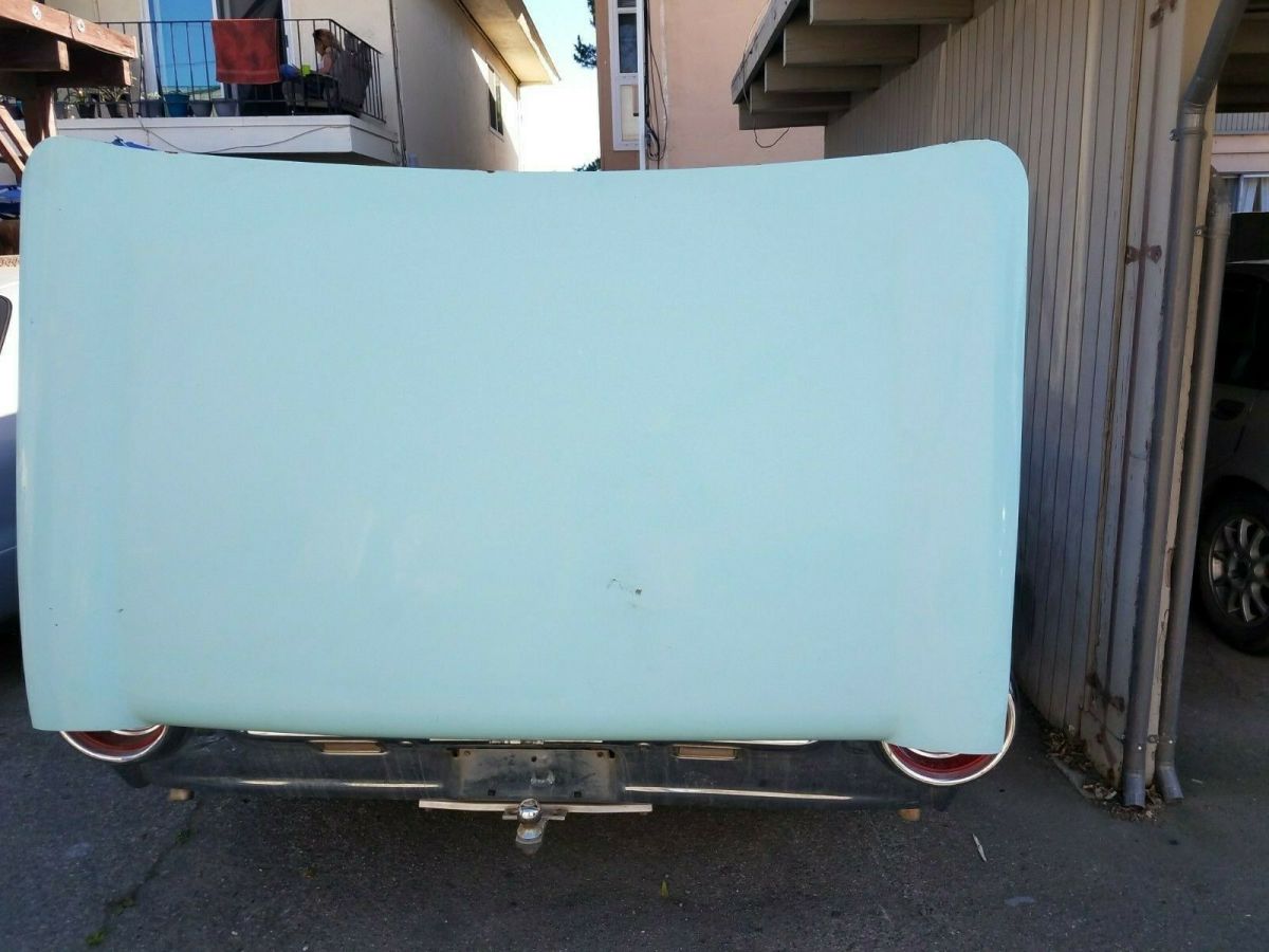 1962 Turquoise Ford Thunderbird Convertible