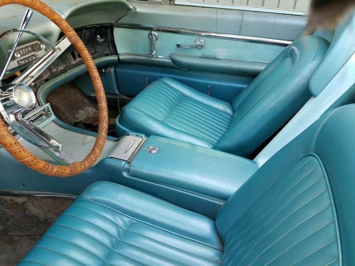 1962 Turquoise Ford Thunderbird Convertible