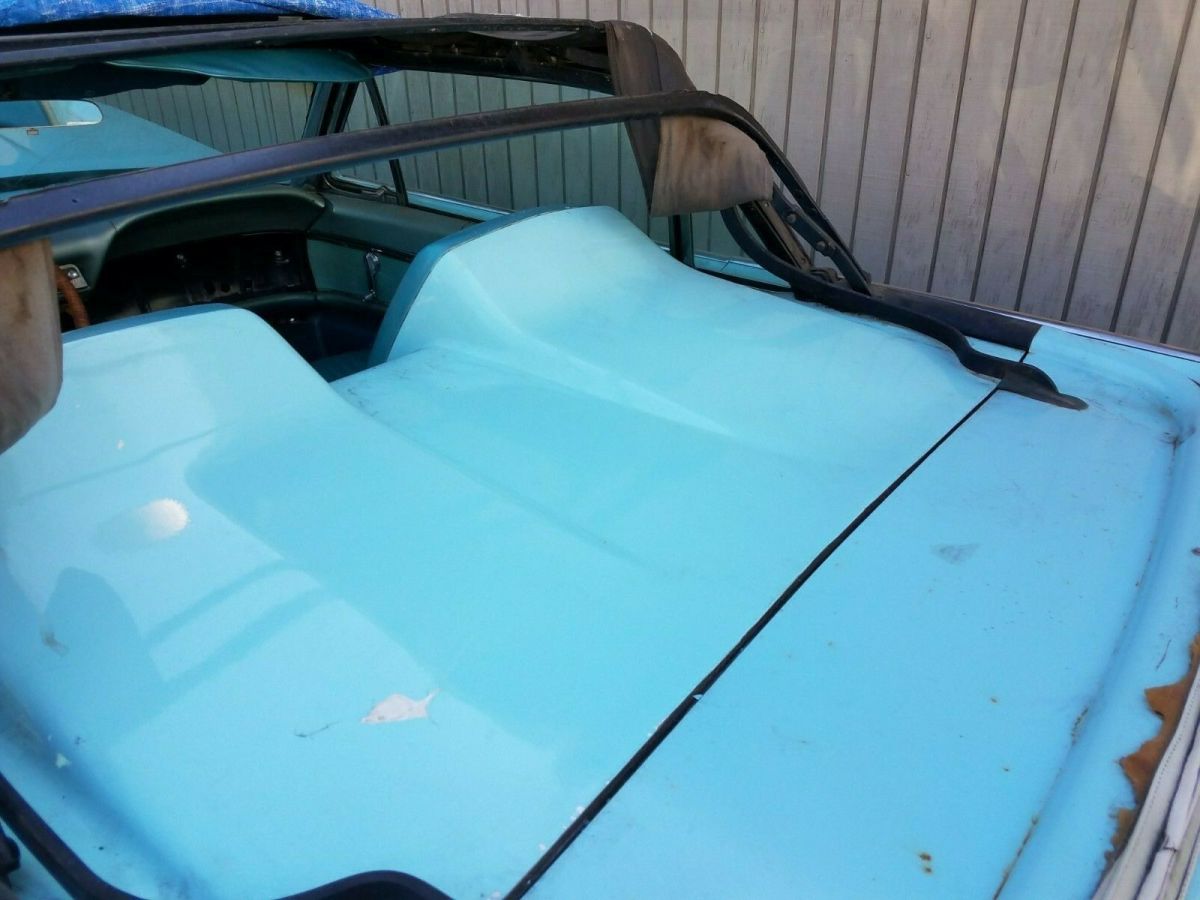 1962 Turquoise Ford Thunderbird Convertible