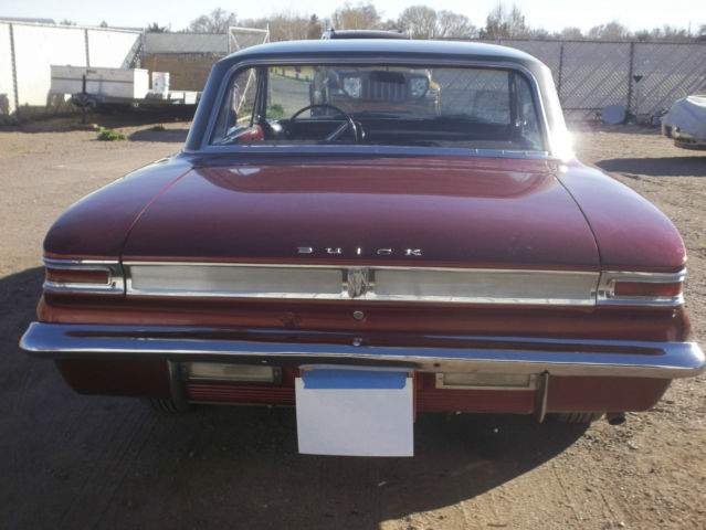 1962 Maroon/Grey Buick Skylark Coupe