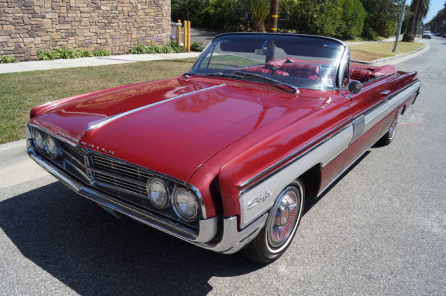 1962 Garnet Mist Metallic Oldsmobile Starfire Convertible